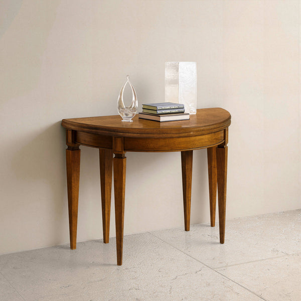 Console tavolo rotondo e ovale allungabile Tiziano in finitura Bassano chiaro anticato, calore classico e venature naturali che raccontano la tradizione Piombini.