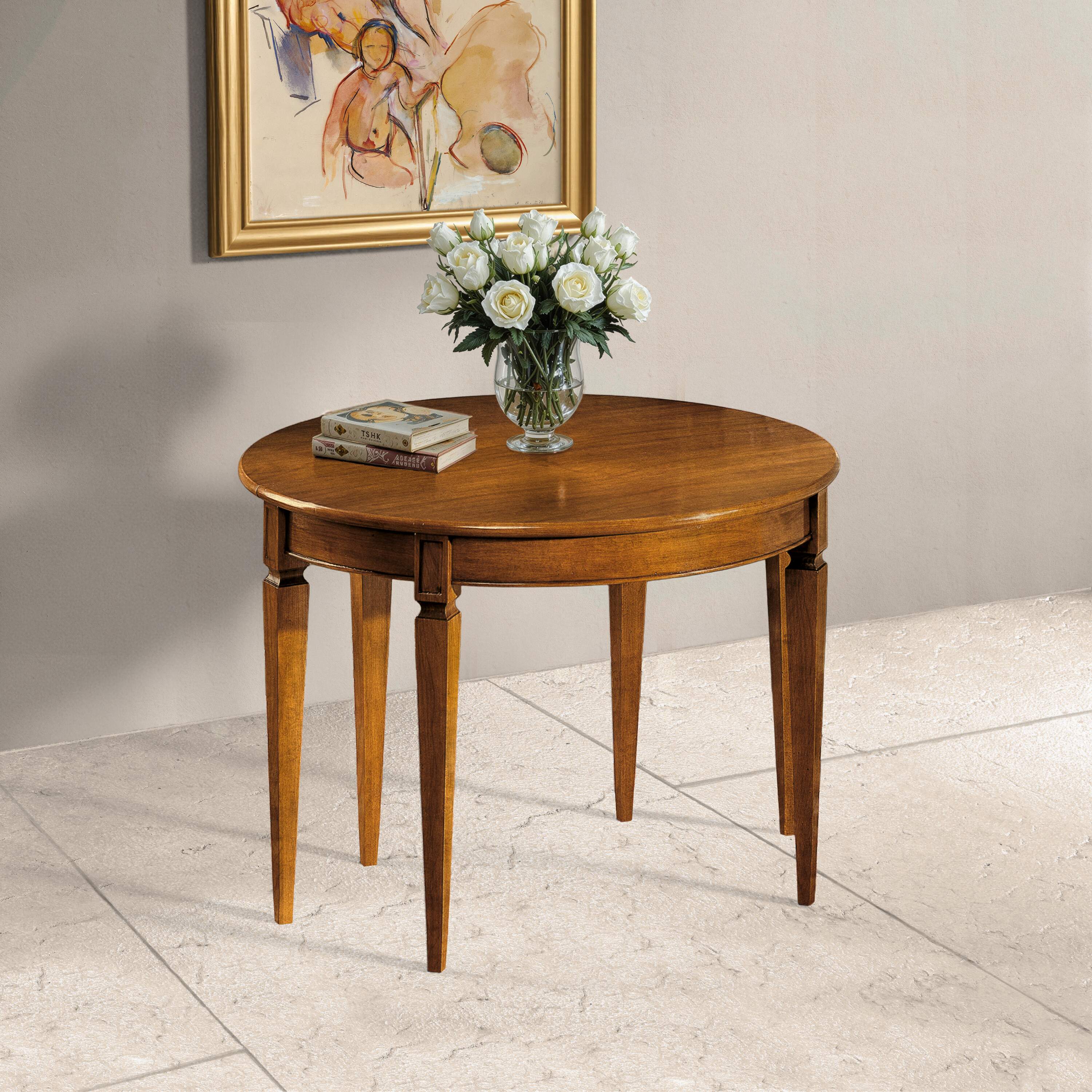 Console tavolo rotondo e ovale classico allungabile Tiziano in ciliegio, aperto nella configurazione rotonda: eleganza, solidità e convivialità artigianale.