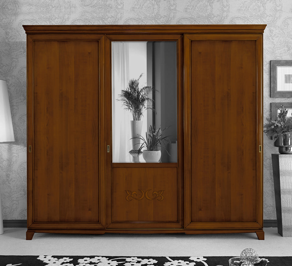 Armoire-penderie classique D'Este en bois avec pieds, trois portes coulissantes, miroir biseauté et décor central, disponible en modèles P3116K L 284 cm et P3117K L 246 cm.